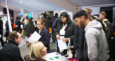 Who exhibits at a Regular Jobs Fair?