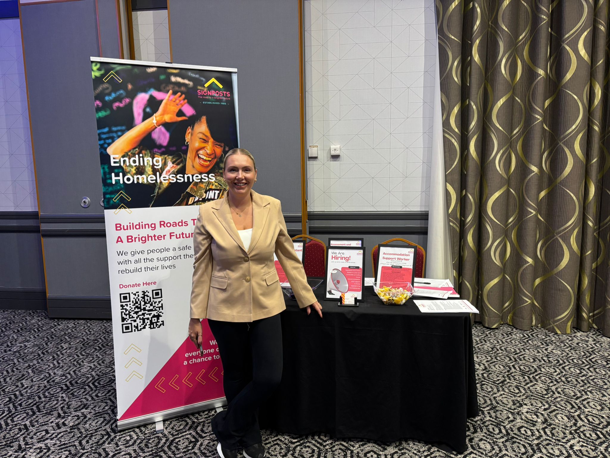 Signposts at our event in Luton